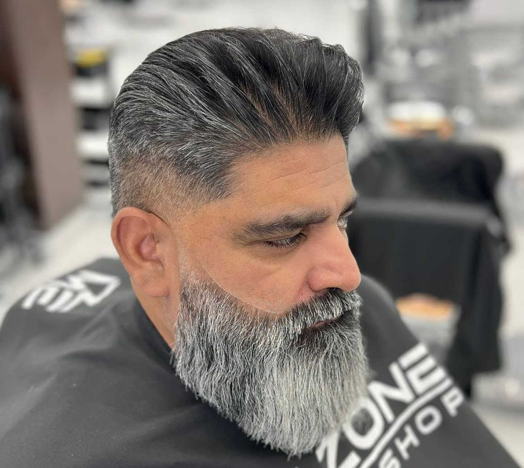 Professional haircuts for men over 40 at Therapeutic Cuts barbershop in Queens NYC