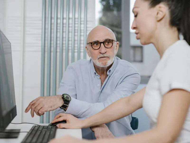 Professional hair restoration consultation for women comparing SMP options