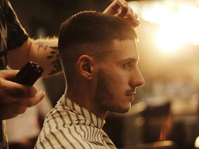 Precision clipper haircut service at a Queens barbershop